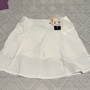 Ladies Golf Wear! Puma sleeveless top and cute skort bottom.